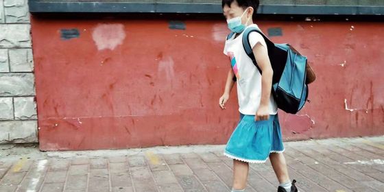 boy wearing skirt